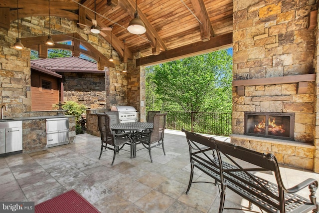 2042 Folk Rd, Fogelsville, PA 18051 - view of patio with an outdoor stone fireplace, outdoor dining space, a gazebo, and ceiling fan