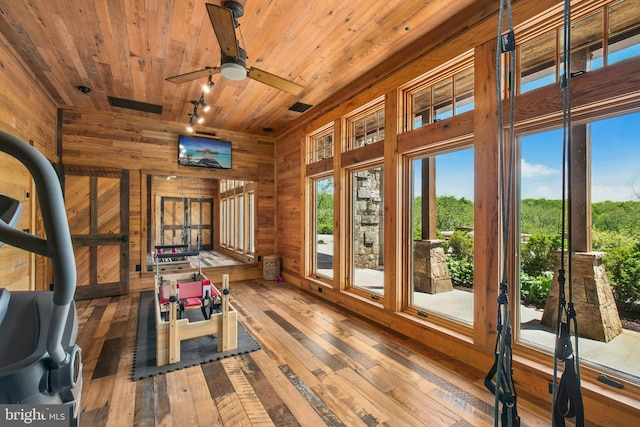 2042 Folk Rd, Fogelsville, PA 18051 - recreation room featuring wood ceiling, wood walls, hardwood / wood-style floors, and a ceiling fan