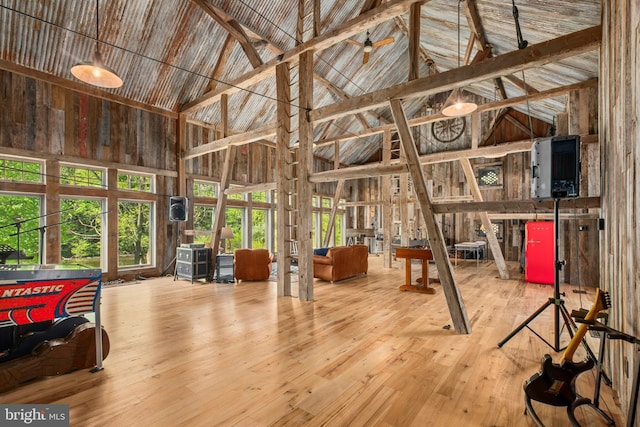 2042 Folk Rd, Fogelsville, PA 18051 - miscellaneous room with high vaulted ceiling and hardwood / wood-style floors