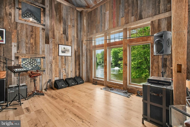 2042 Folk Rd, Fogelsville, PA 18051 - interior space featuring wood finished floors, wood walls, and a high ceiling