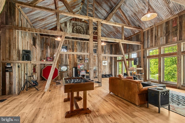2042 Folk Rd, Fogelsville, PA 18051 - miscellaneous room featuring high vaulted ceiling, hardwood / wood-style flooring, and wooden walls