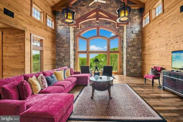 2042 Folk Rd, Fogelsville, PA 18051 - living area featuring high vaulted ceiling, wood walls, hardwood / wood-style flooring, and wooden ceiling with exposed beams