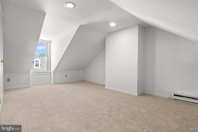 303 Coral St, Lancaster, PA 17603 - additional living space featuring vaulted ceiling, carpet floors, a baseboard radiator, baseboards, and recessed lighting