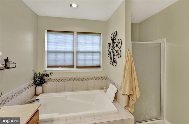 159 Waterford Ln, Reading, PA 19606 - bathroom with a stall shower, a bath, vanity, and recessed lighting