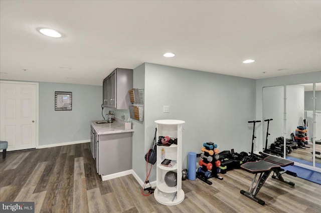 159 Waterford Ln, Reading, PA 19606 - exercise room featuring dark wood-style floors, baseboards, and recessed lighting