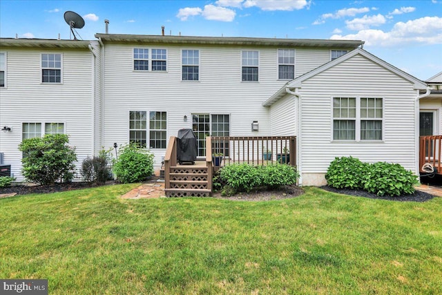 159 Waterford Ln, Reading, PA 19606 - rear view of house featuring a wooden deck and a lawn