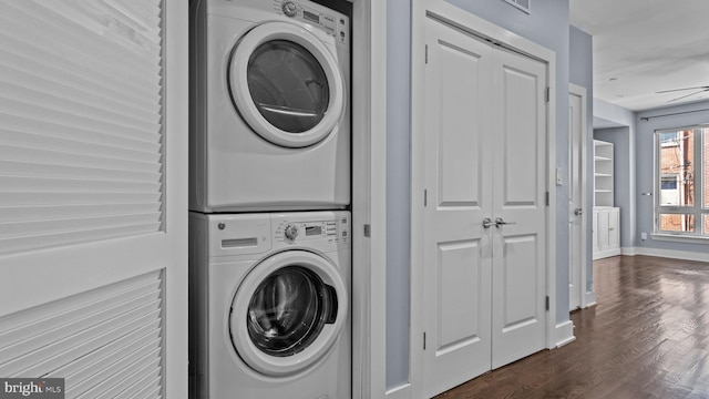 547 N 12th St Unit 2, Philadelphia, PA 19123 - washroom with stacked washing machine and dryer, dark wood-style flooring, and baseboards