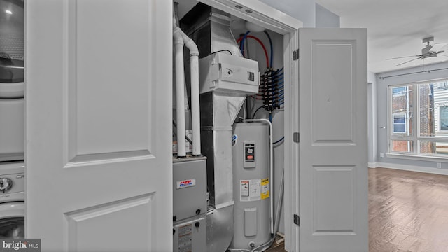 547 N 12th St Unit 2, Philadelphia, PA 19123 - utilities featuring stacked washer / drying machine and electric water heater