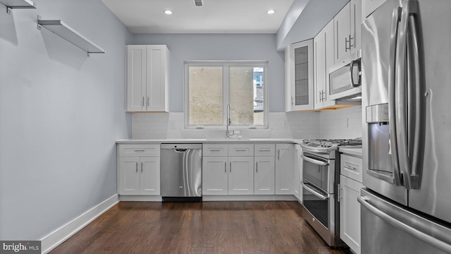 547 N 12th St Unit 2, Philadelphia, PA 19123 - kitchen featuring stainless steel appliances, a sink, white cabinetry, tasteful backsplash, and recessed lighting