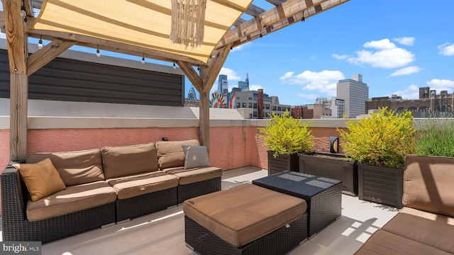 547 N 12th St Unit 2, Philadelphia, PA 19123 - view of patio with outdoor lounge area, a skyline view, and a pergola