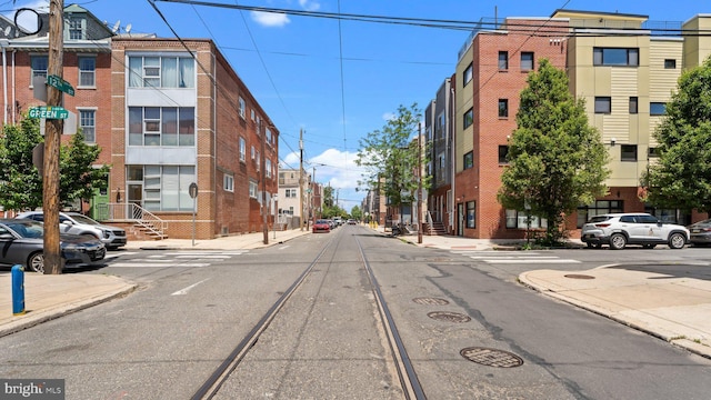 547 N 12th St Unit 2, Philadelphia, PA 19123 - view of asphalt road featuring sidewalks, curbs, and street lights