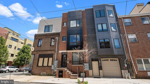 547 N 12th St Unit 2, Philadelphia, PA 19123 - view of property featuring driveway
