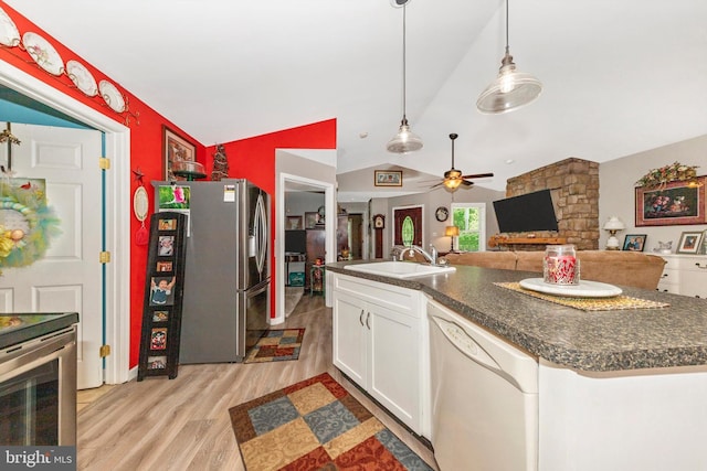 343 Mill Farm Trl, Berkeley Springs, WV 25411 - kitchen featuring appliances with stainless steel finishes, a sink, dark countertops, ceiling fan, and lofted ceiling
