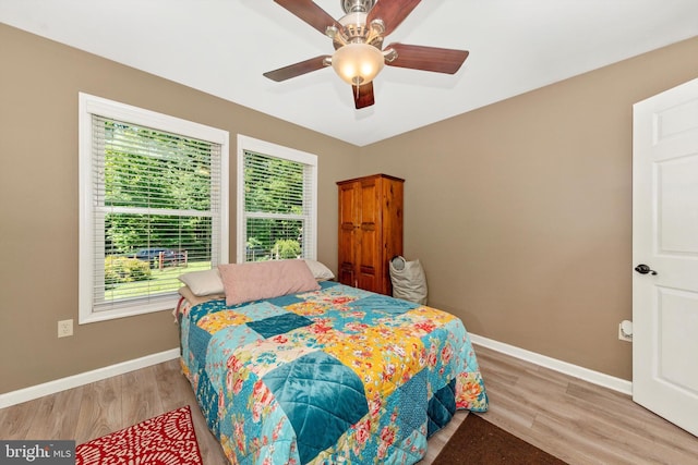 343 Mill Farm Trl, Berkeley Springs, WV 25411 - bedroom featuring wood finished floors, baseboards, and ceiling fan