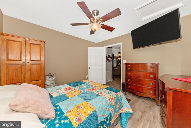 343 Mill Farm Trl, Berkeley Springs, WV 25411 - bedroom with light wood finished floors and a ceiling fan