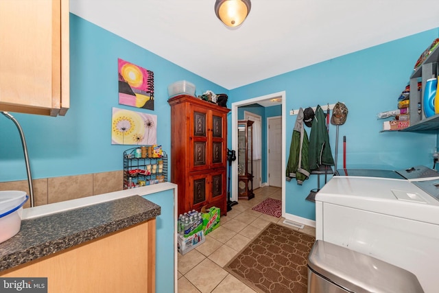 343 Mill Farm Trl, Berkeley Springs, WV 25411 - laundry room with washing machine and clothes dryer and light tile patterned floors