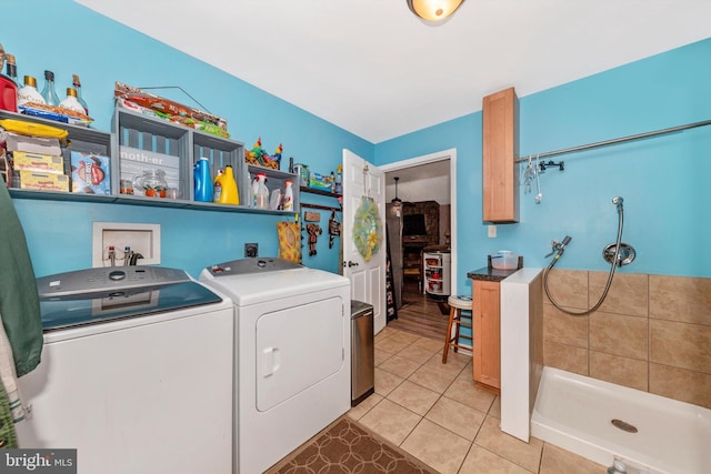 343 Mill Farm Trl, Berkeley Springs, WV 25411 - laundry area featuring washing machine and clothes dryer and light tile patterned floors
