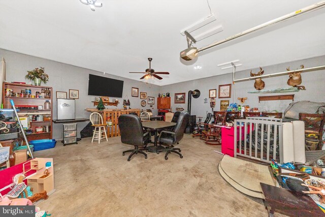 343 Mill Farm Trl, Berkeley Springs, WV 25411 - office area with unfinished concrete flooring and ceiling fan