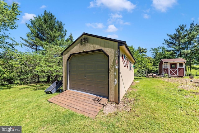 343 Mill Farm Trl, Berkeley Springs, WV 25411 - detached garage featuring a storage unit