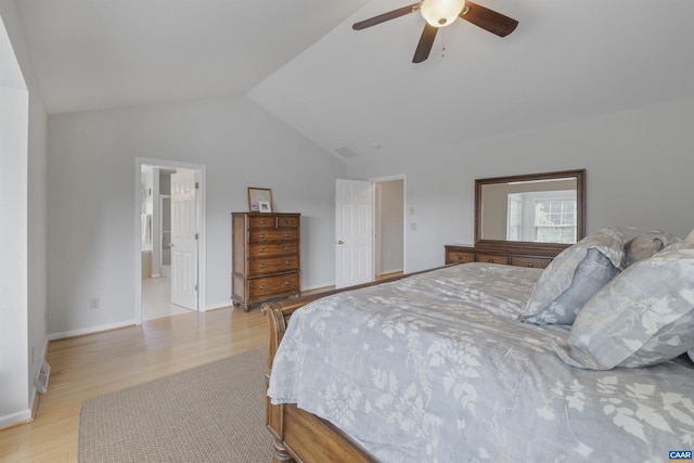989 Clearfields Ln, Crozet, VA 22932 - bedroom featuring light wood-style floors, lofted ceiling, a ceiling fan, baseboards, and connected bathroom