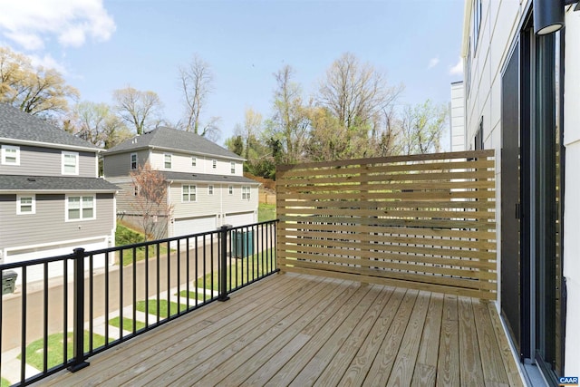 983 5th St SW, Charlottesville, VA 22902 - wooden deck with a garage