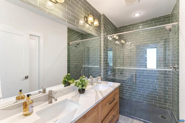 983 5th St SW, Charlottesville, VA 22902 - full bathroom featuring double vanity and a stall shower