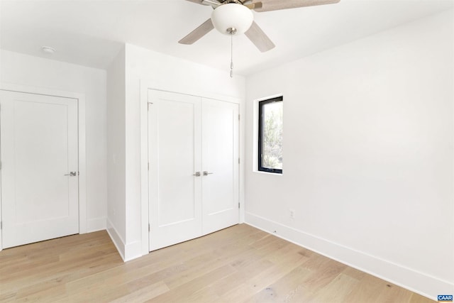 983 5th St SW, Charlottesville, VA 22902 - unfurnished bedroom with baseboards, light wood-style floors, a closet, and ceiling fan