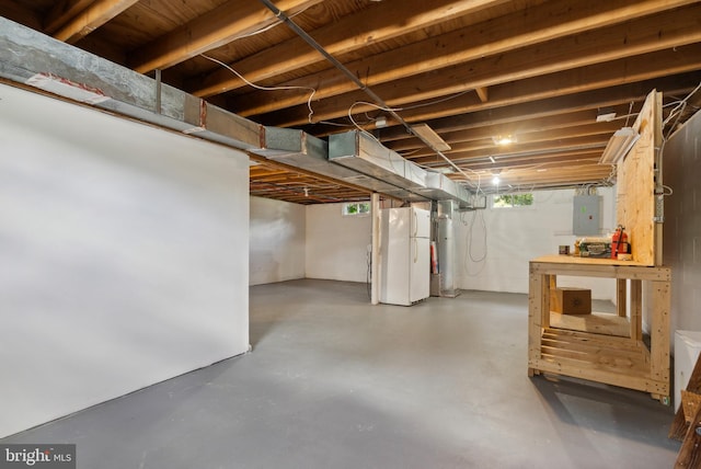 7 Breckenridge Dr, Sicklerville, NJ 08081 - basement with freestanding refrigerator, electric panel, and water heater