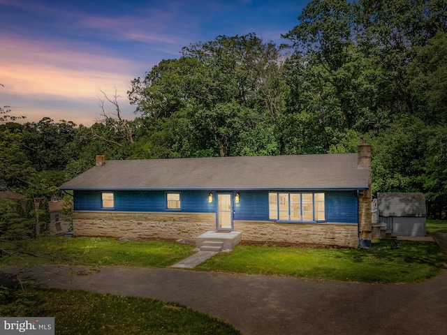220 Firetower Rd, Port Deposit, MD 21904 - ranch-style house with stone siding, a chimney, a lawn, and a storage shed