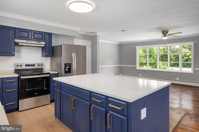 220 Firetower Rd, Port Deposit, MD 21904 - kitchen with appliances with stainless steel finishes, under cabinet range hood, blue cabinets, a ceiling fan, and crown molding