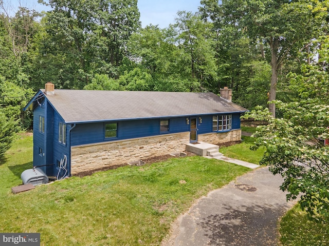 220 Firetower Rd, Port Deposit, MD 21904 - view of front of home with a chimney, a front yard, and stone siding