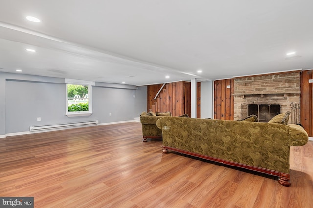 220 Firetower Rd, Port Deposit, MD 21904 - living area with a baseboard radiator, wood finished floors, a fireplace, baseboards, and recessed lighting
