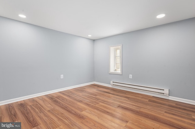 220 Firetower Rd, Port Deposit, MD 21904 - spare room featuring baseboard heating, wood finished floors, baseboards, and recessed lighting