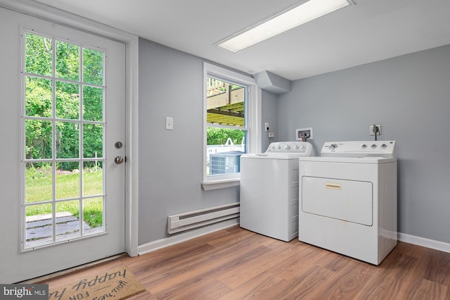 220 Firetower Rd, Port Deposit, MD 21904 - laundry area featuring a baseboard heating unit, separate washer and dryer, wood finished floors, and baseboards