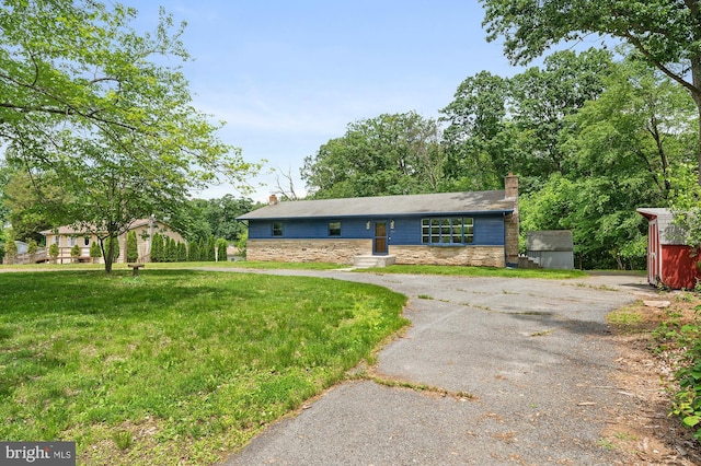220 Firetower Rd, Port Deposit, MD 21904 - view of front of house featuring a chimney, stone siding, and a front yard