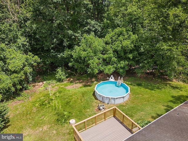 220 Firetower Rd, Port Deposit, MD 21904 - view of green lawn featuring a deck and an outdoor pool
