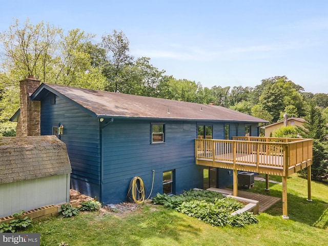 220 Firetower Rd, Port Deposit, MD 21904 - rear view of property featuring a wooden deck, a lawn, a chimney, cooling unit, and roof with shingles