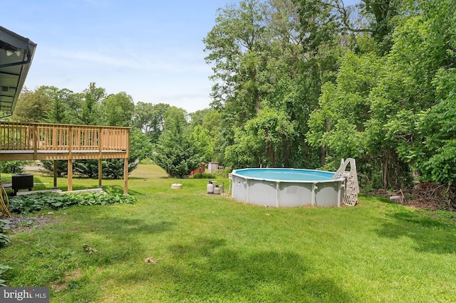 220 Firetower Rd, Port Deposit, MD 21904 - view of grassy yard featuring a deck and an outdoor pool