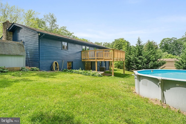 220 Firetower Rd, Port Deposit, MD 21904 - view of grassy yard with a wooden deck and an outdoor pool