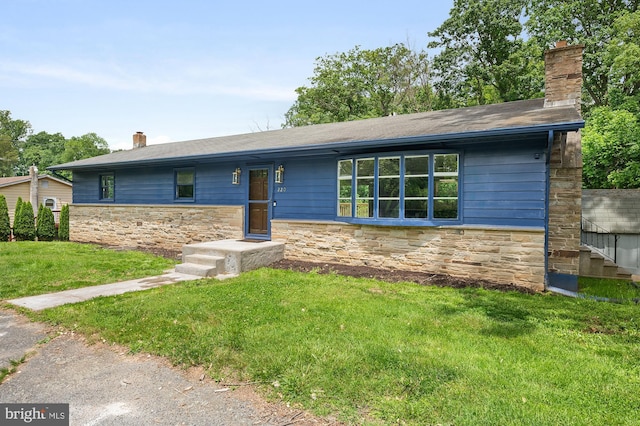 220 Firetower Rd, Port Deposit, MD 21904 - view of front of home featuring stone siding, a chimney, a front yard, and a shingled roof