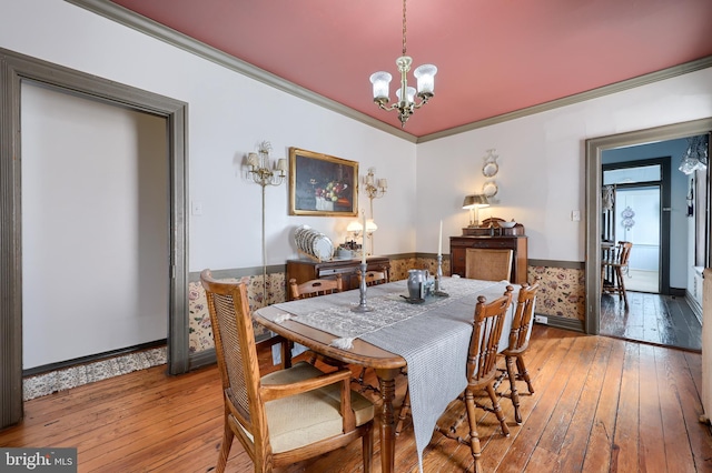 342 N Newberry St, York, PA 17401 - dining room featuring a chandelier, hardwood / wood-style flooring, ornamental molding, and baseboards