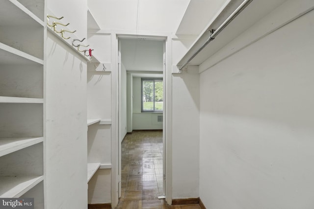 4200 Cathedral Ave NW Unit 317, Washington, DC 20016 - walk in closet featuring wood finished floors