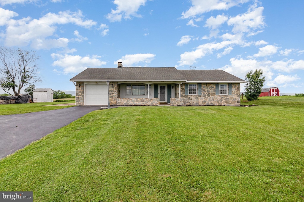 151 Steelstown Rd, Newville, PA 17241 - ranch-style home with stone siding, driveway, a garage, a chimney, and a front yard