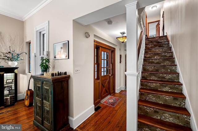 522 S Hanover St, Baltimore, MD 21201 - staircase with hardwood / wood-style flooring, baseboards, and ornamental molding