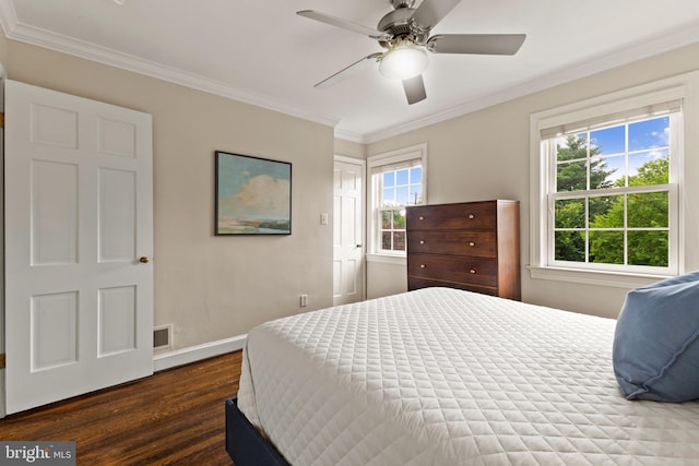 823 Church St, Alexandria, VA 22314 - bedroom with dark wood finished floors, ornamental molding, baseboards, and ceiling fan