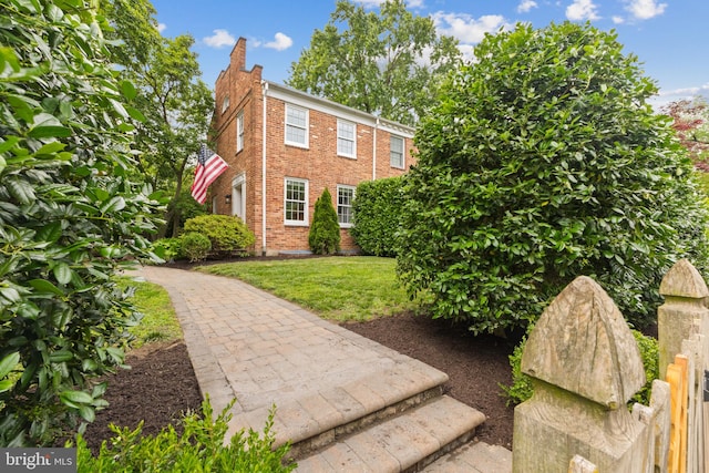 823 Church St, Alexandria, VA 22314 - view of front of property with brick siding and a front lawn