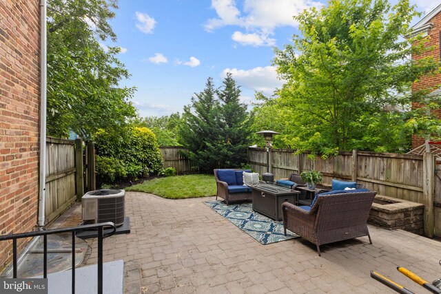 823 Church St, Alexandria, VA 22314 - fenced backyard featuring cooling unit, outdoor lounge area, and a patio