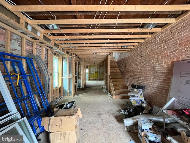 623 N Luzerne Ave, Baltimore, MD 21205 - miscellaneous room featuring brick wall
