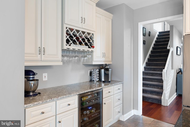 124 Willow Grove Mill Dr, Middletown, DE 19709 - indoor dry bar with beverage cooler, stairway, and baseboards