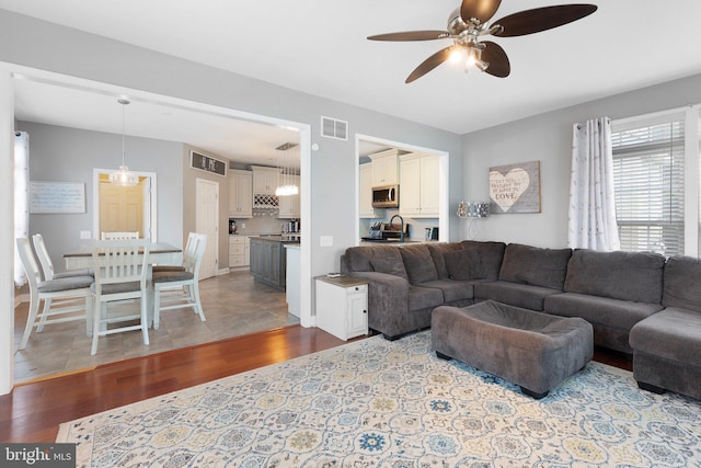 124 Willow Grove Mill Dr, Middletown, DE 19709 - living room with wood finished floors and a ceiling fan